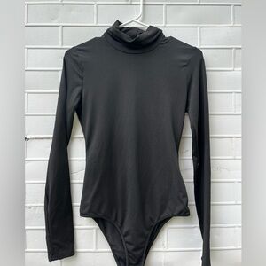 Black turtleneck bodysuit